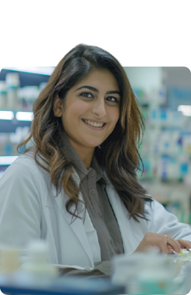 Student smiling in pharmacy lab